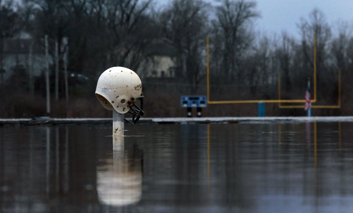 Arnold football field flooded, equipment floats away